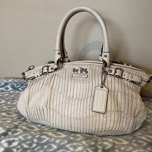 Unique off white Coach handbag